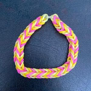 Pink and yellow fishtail adult bracelet